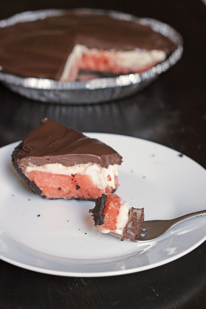 A piece of sorbet pie on plate with fork