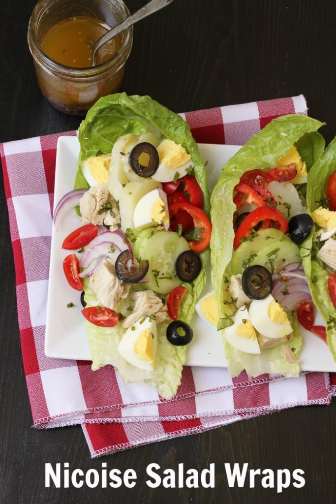 niçoise lettuce wraps on white plate