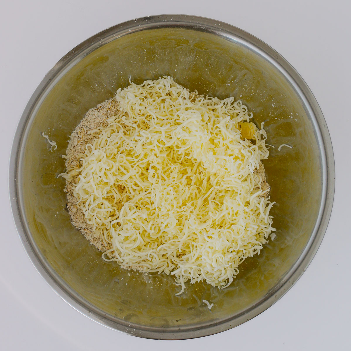 shredded butter added to topping ingredients.