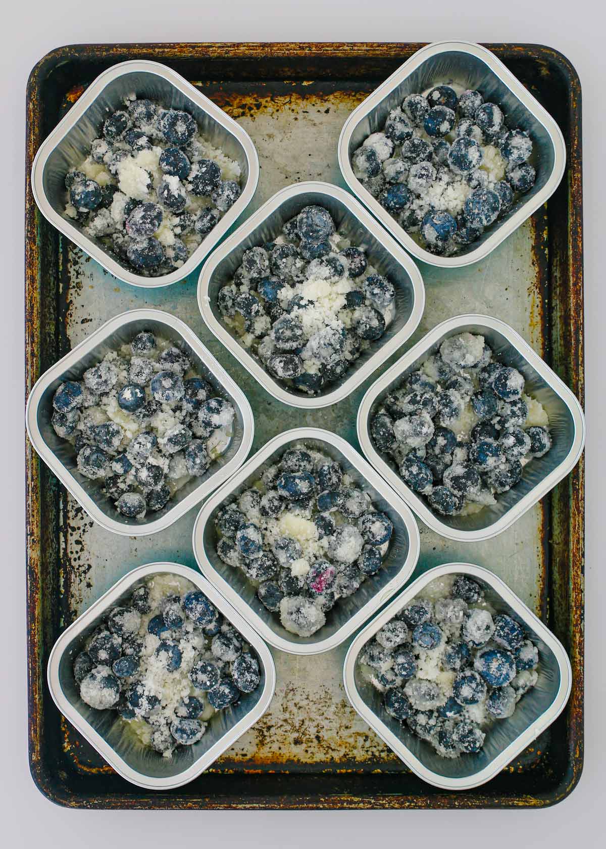 blueberry mixture added to the baking dishes.