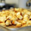 A close up of croutons on tray