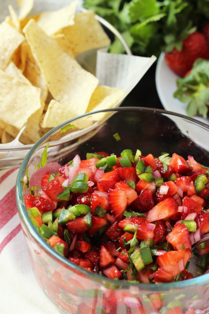 bowl of strawberry salsa with chips