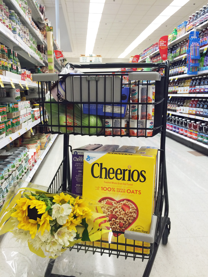 cart of groceries and flowers
