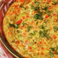 southwestern oven omelet on red cloth