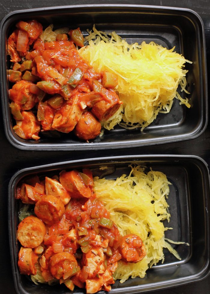 plastic containers filled with squash and jambalaya