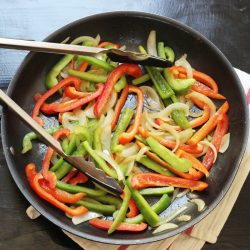 fajita vegetables in skillet