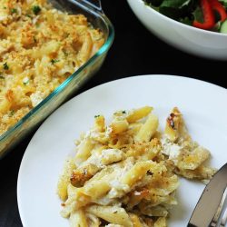 casserole dished onto plate near serving dishes