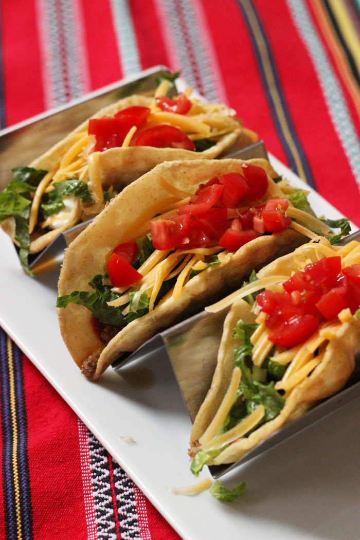 three fried taco shells filled