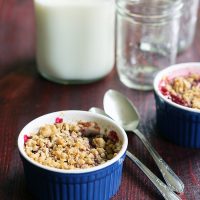 cherry crisp with milk jug and glasses