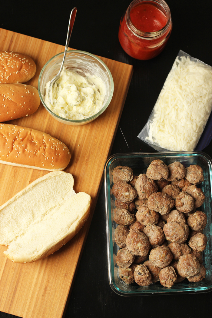 Meatball Sub ingredients on a cutting board