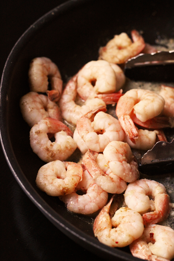 skillet with shrimp cooking