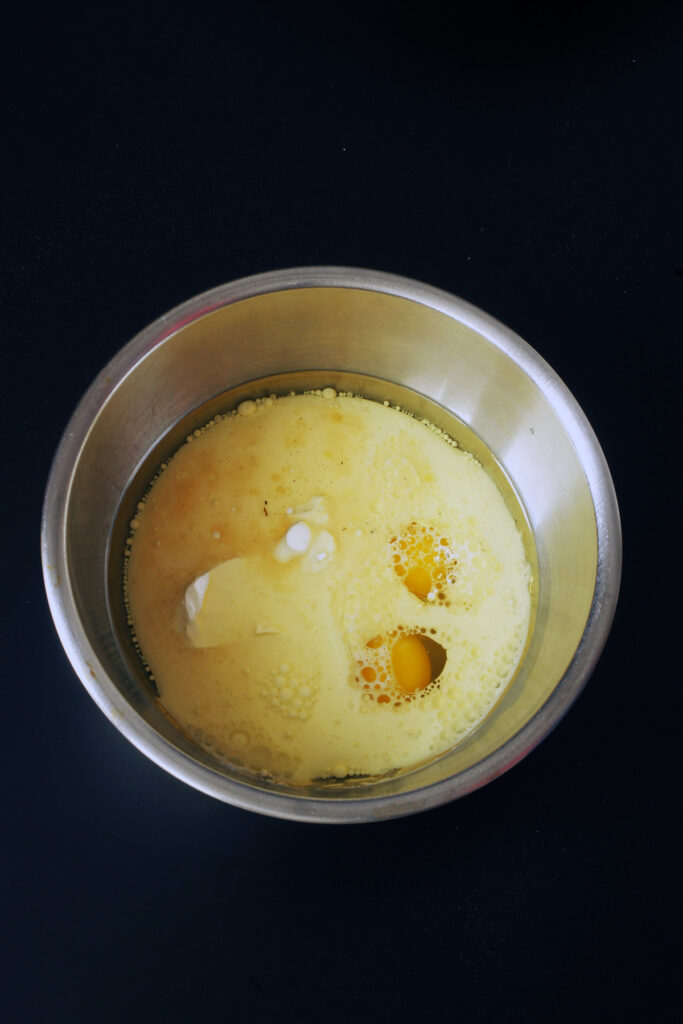 eggs, oil, yogurt, and milk in bowl
