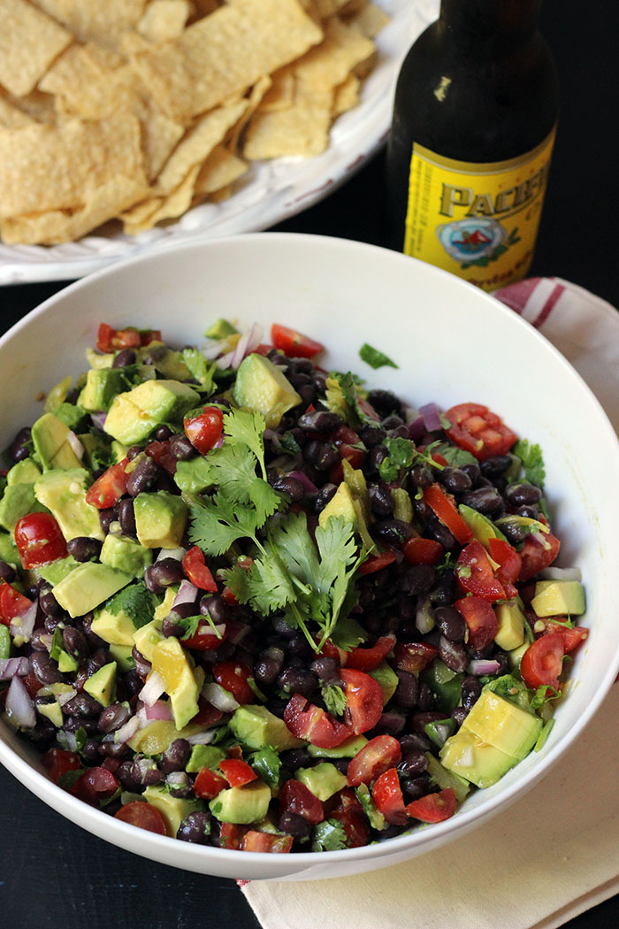 Santa Barbara Cowboy Caviar in a bowl, with beer