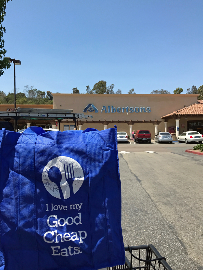 Good Cheap Eats grocery bag in front of Albertsons 