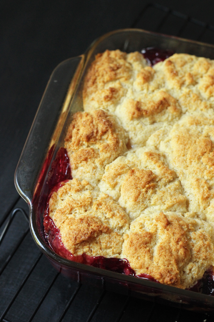 fruit cobbler in glass baking pan