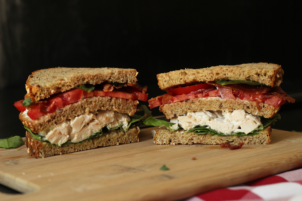 chicken salad club sandwich cut in half