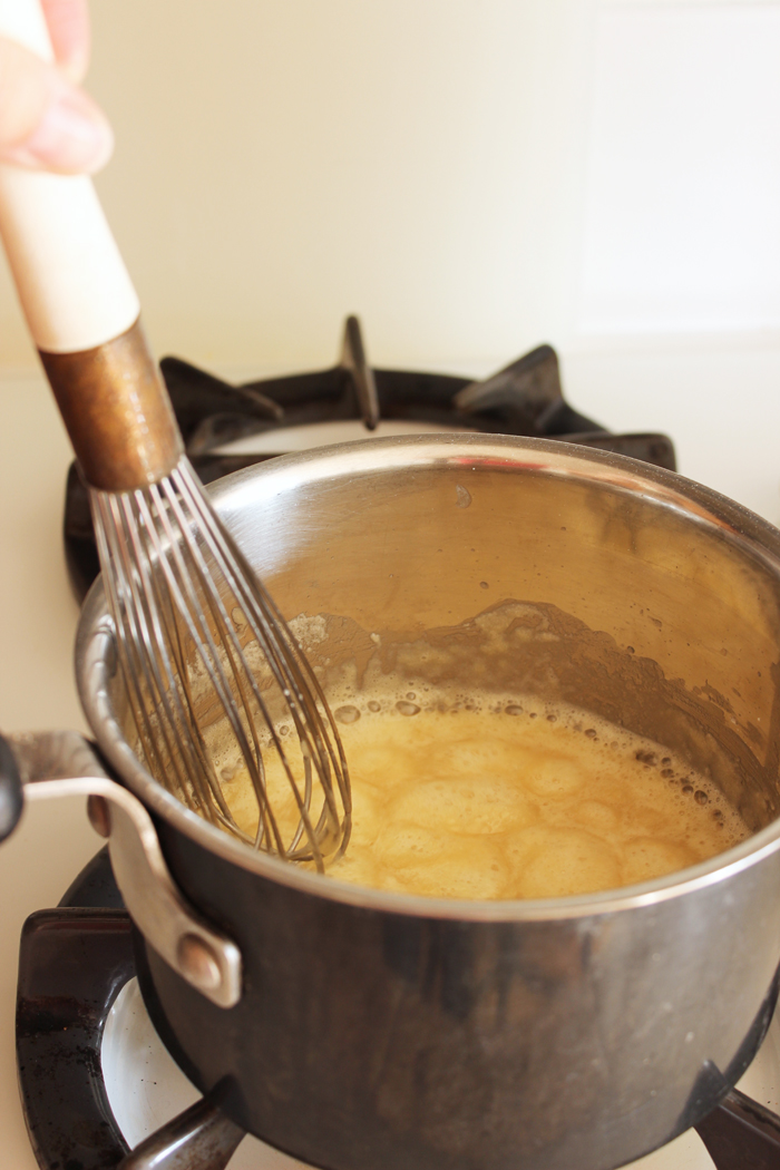 gravy being whisked on the stove