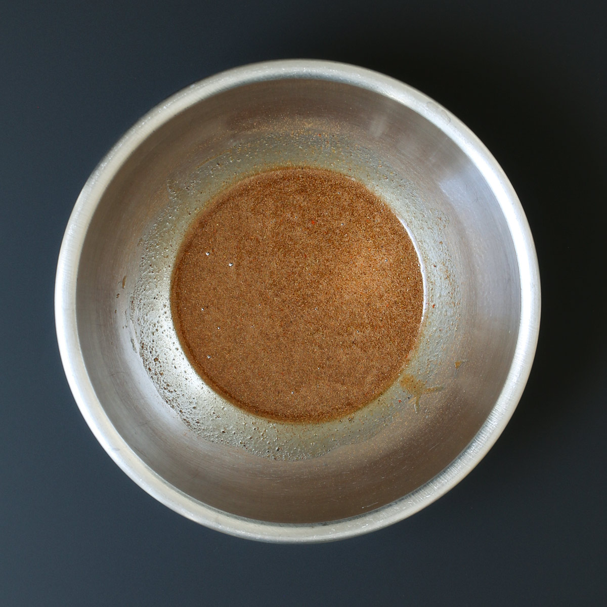 spice-syrup mixture in bowl.