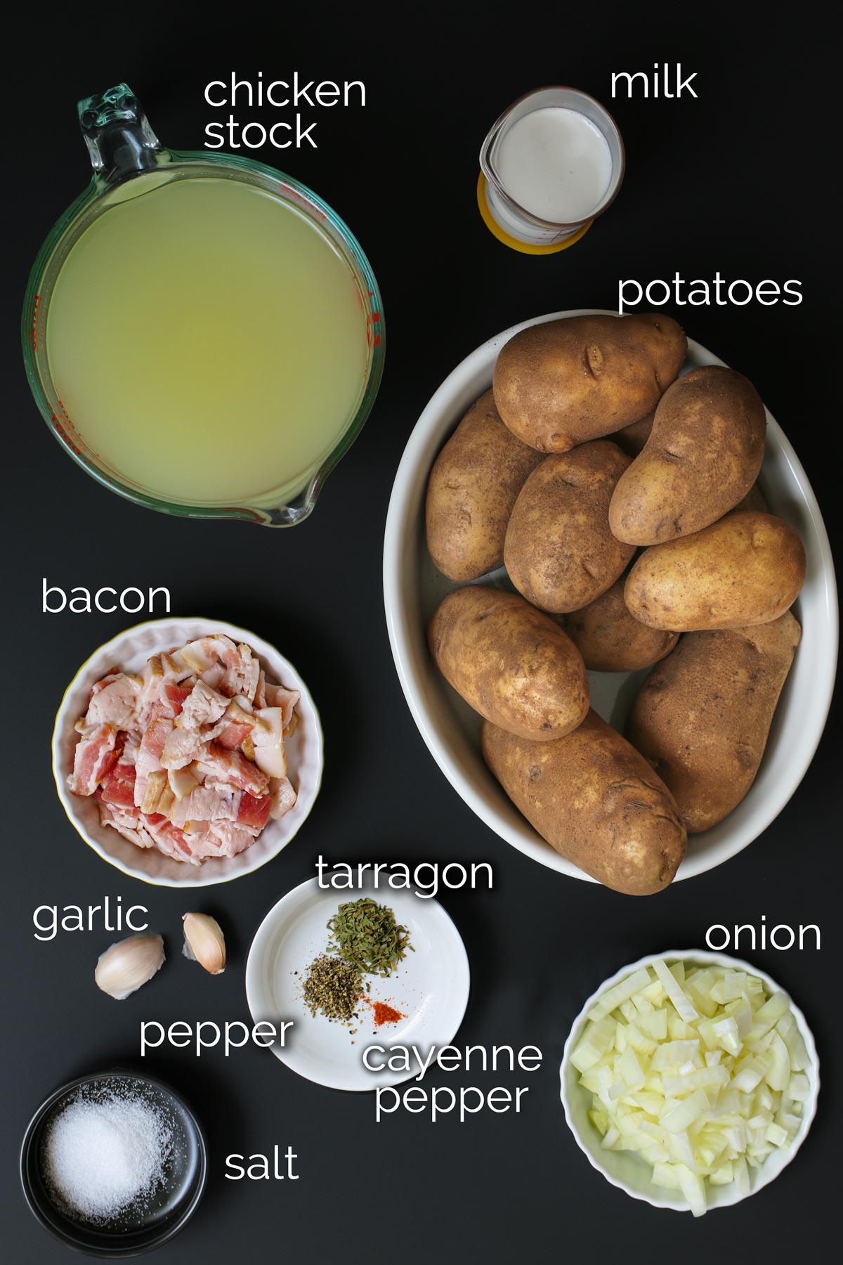 ingredients for instant pot potato soup laid out on black counter.