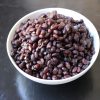 A bowl of cooked black beans