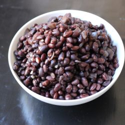 A bowl of cooked black beans