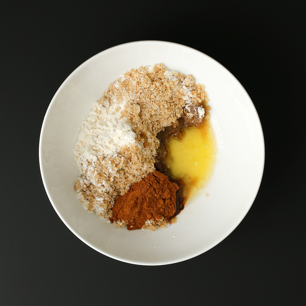 cinnamon sugar topping ingredients in white bowl.