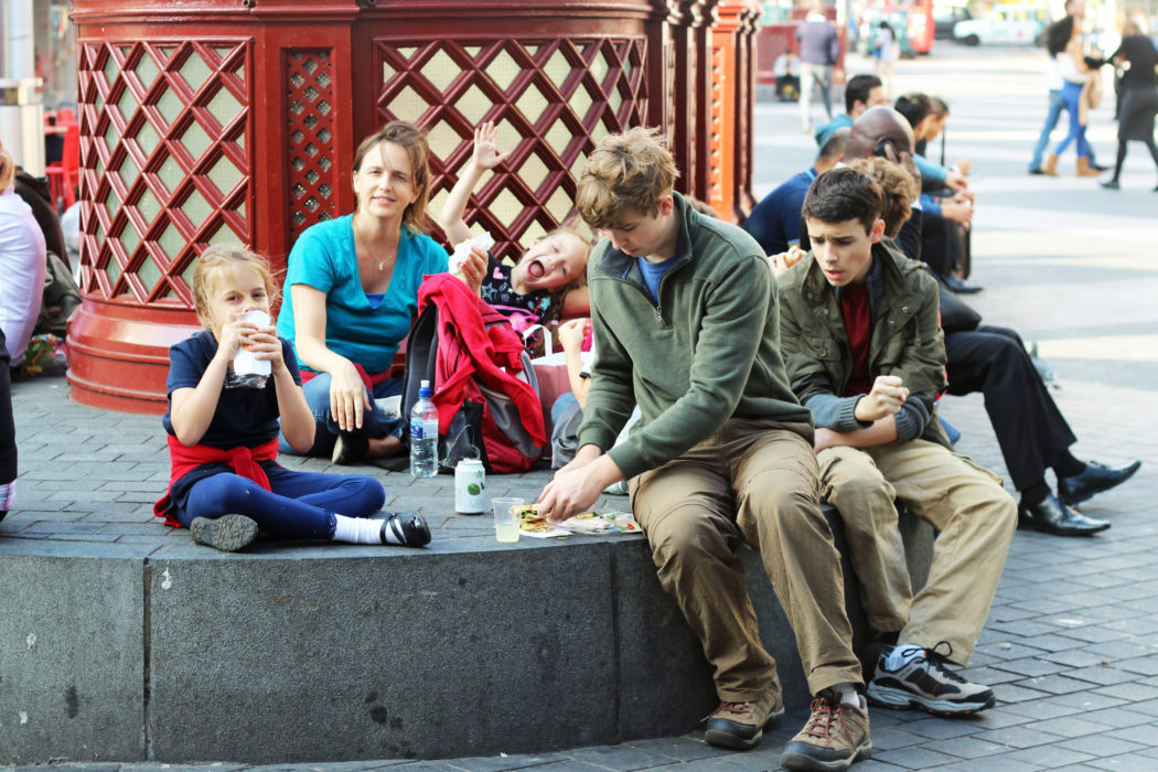 mom and kids picnicking in London