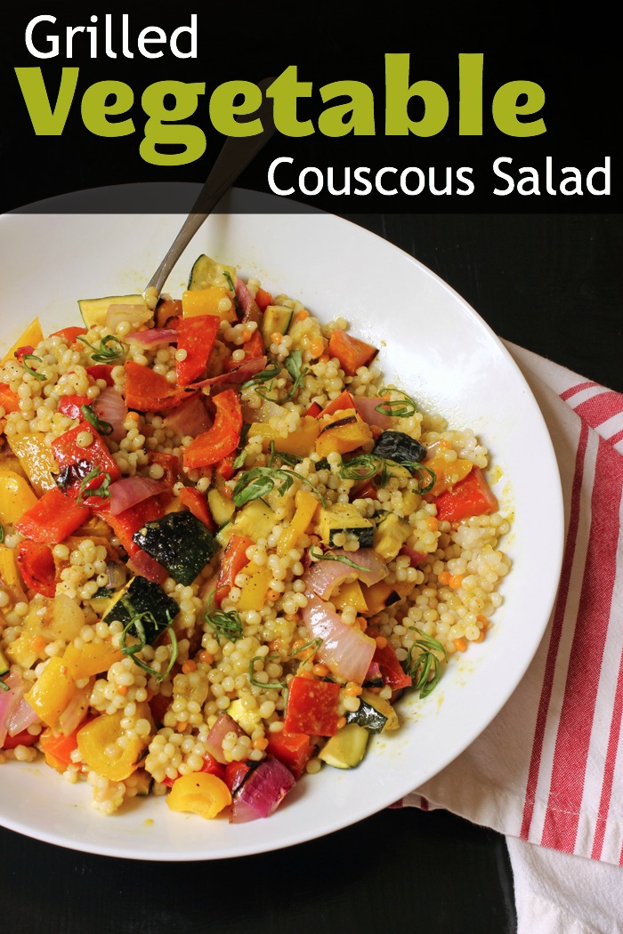 grilled vegetable couscous salad in white bowl with spoon