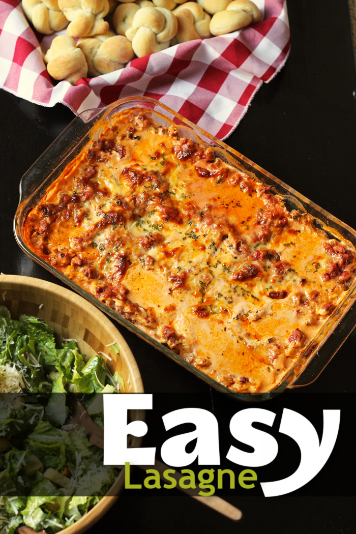 salad, pan of lasagne, garlic knots