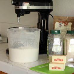 baking ingredients butter sticks and mixer