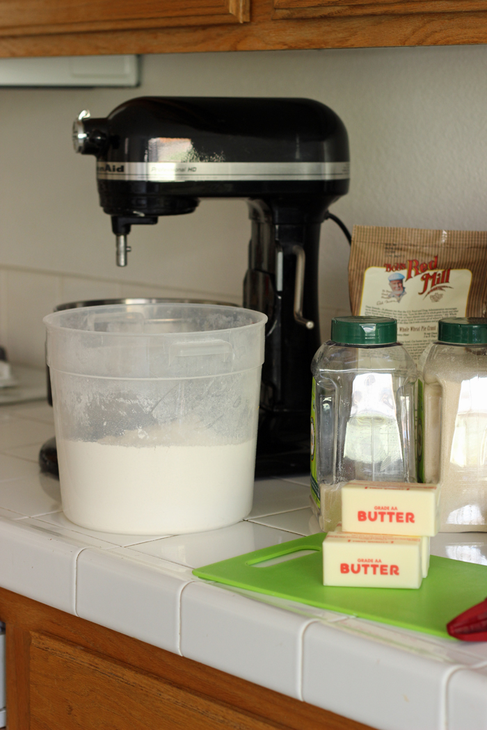 baking ingredients butter sticks and mixer