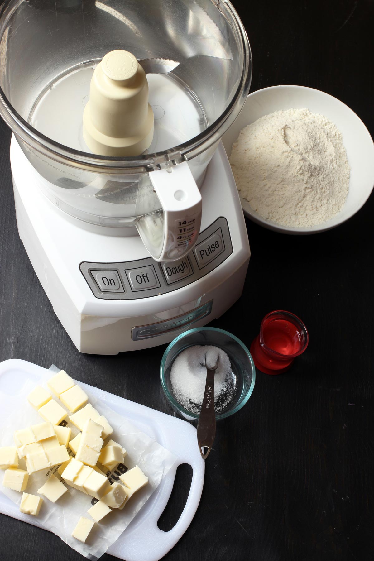 ingredients for pie crust next to food processor