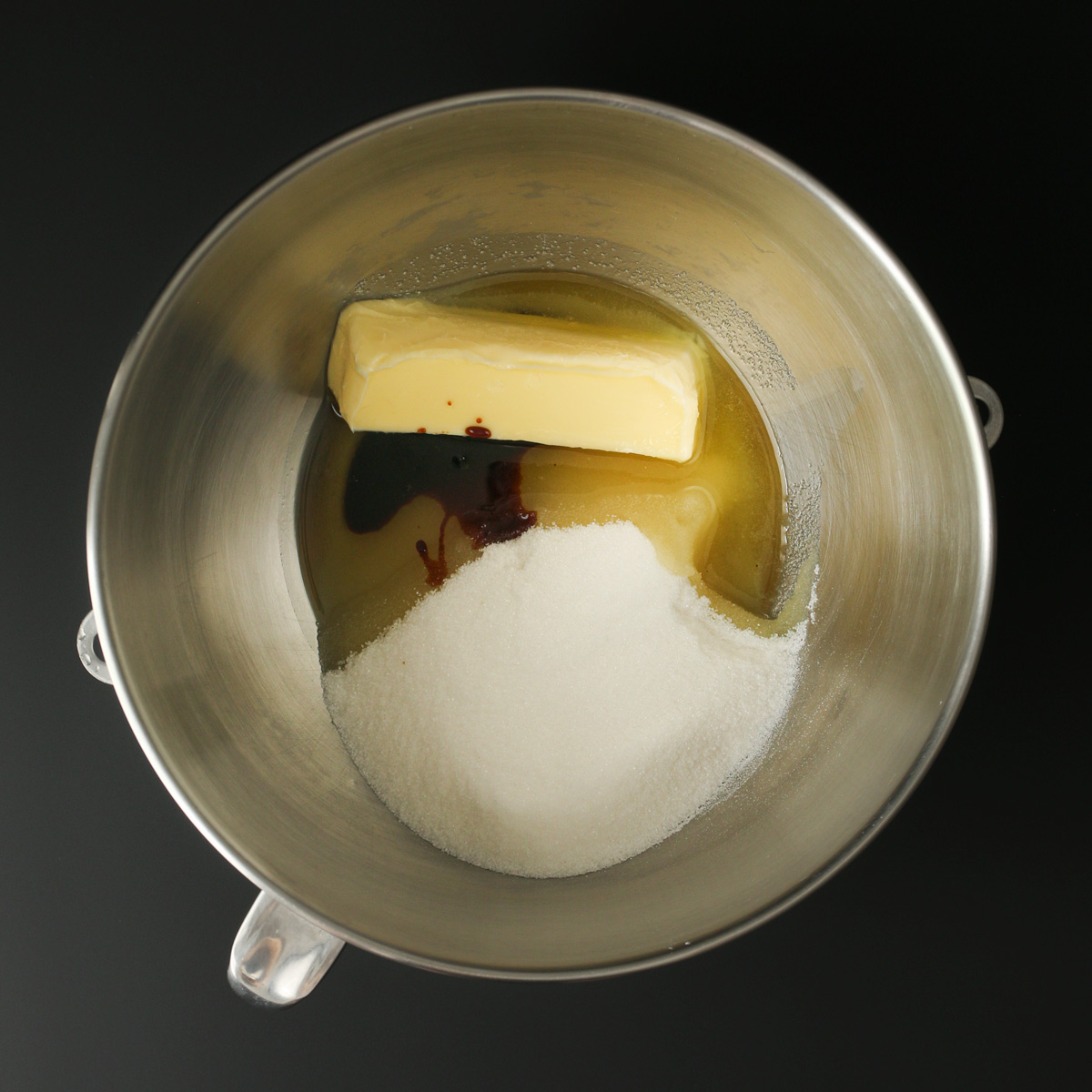 butter, oil, sugar, and molasses in mixing bowl.