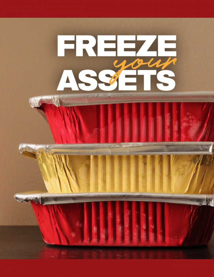 a stack of freezer meals in red and gold aluminum pans