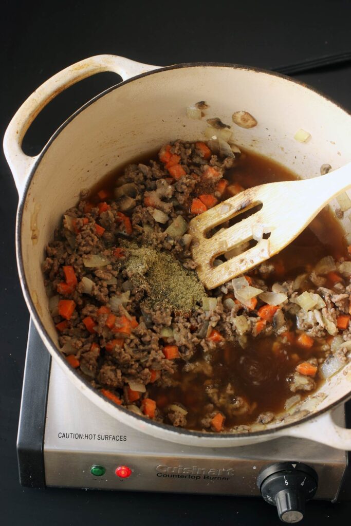 adding spices to filling
