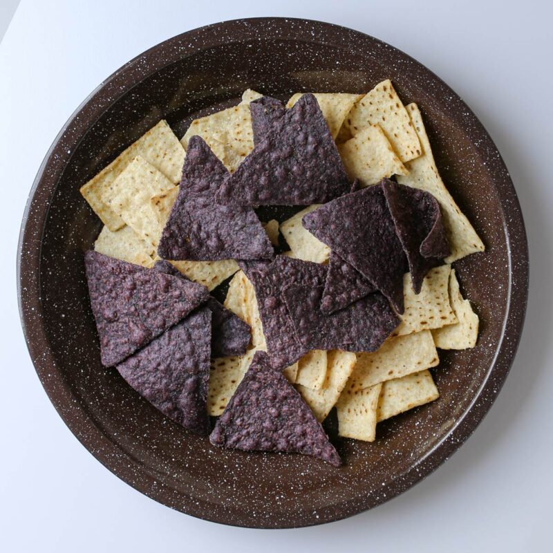 two color chips in a brown pie plate.