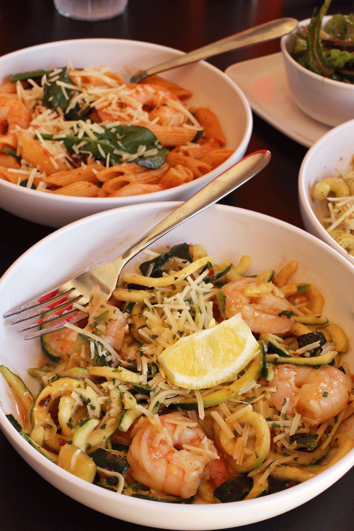 bowls of zucchini noodles and regular noodles