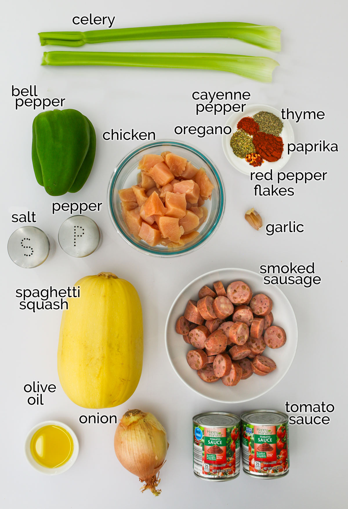 ingredients for spaghetti squash jambalaya on white counter.