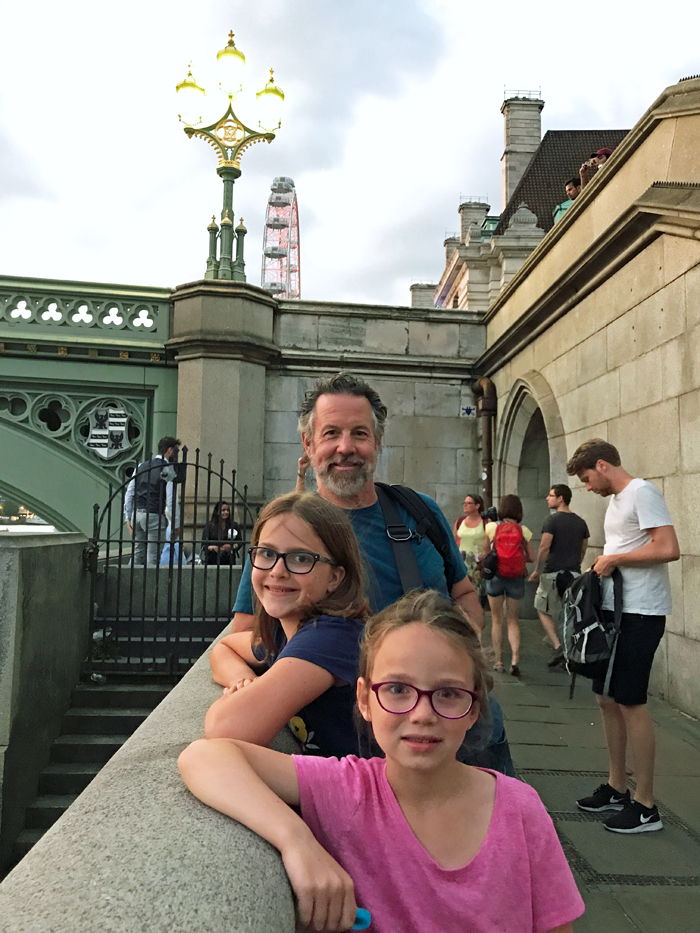 dad and girls on thames bridge