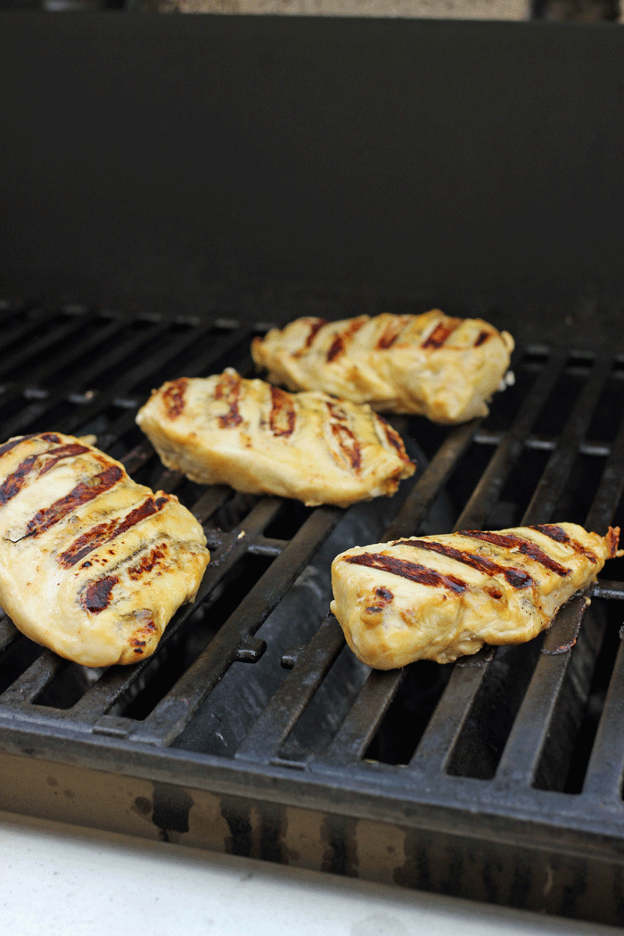 mustard marinated chicken on grill