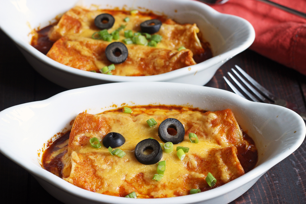 two dishes of cheese enchiladas