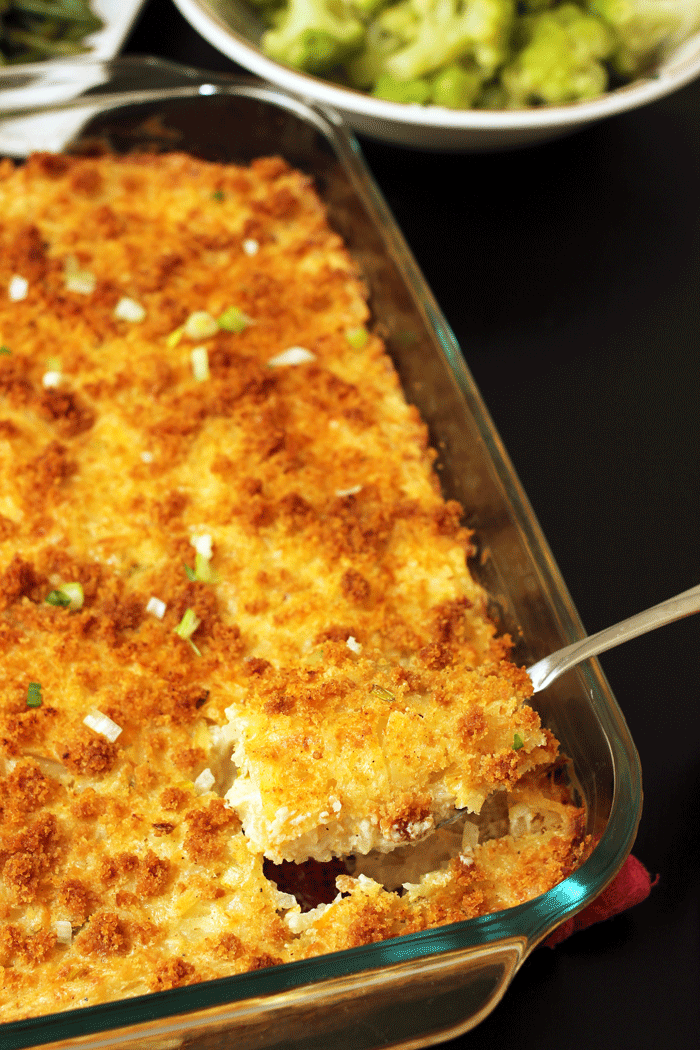 cheesy potatoes baked in casserole dish