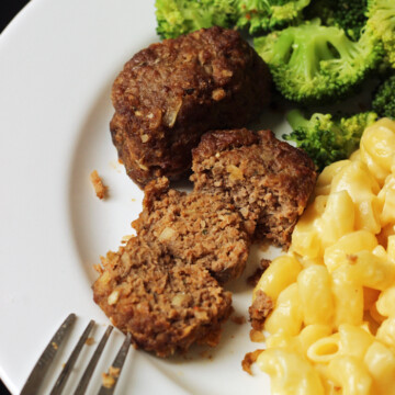 mini meatloaf cut into slices with macaroni and broccoli
