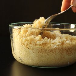 fluffing cooked couscous