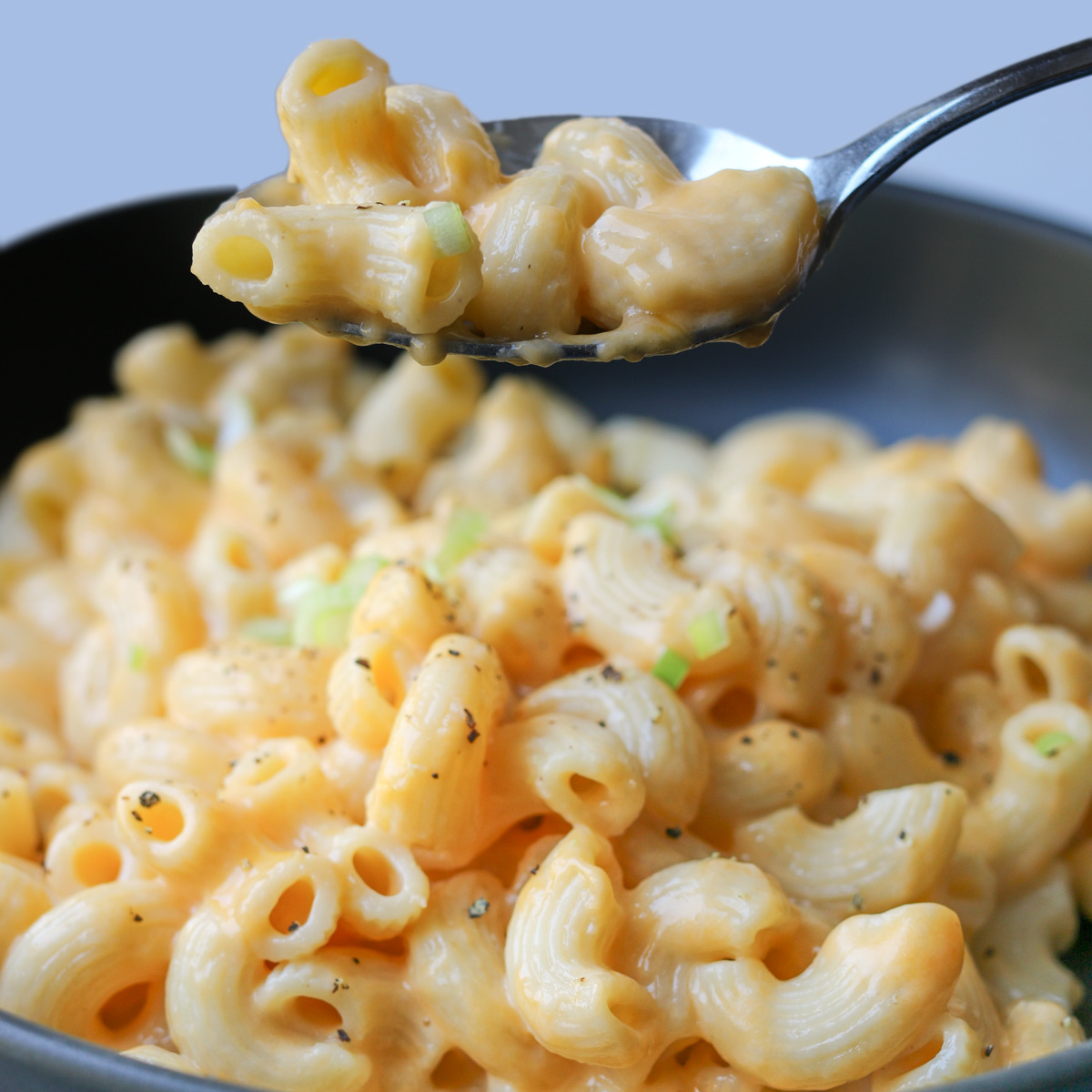 close up of spoonful of instant pot mac and cheese.