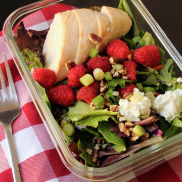 A tray of food on a table, with Raspberry Chicken Salad