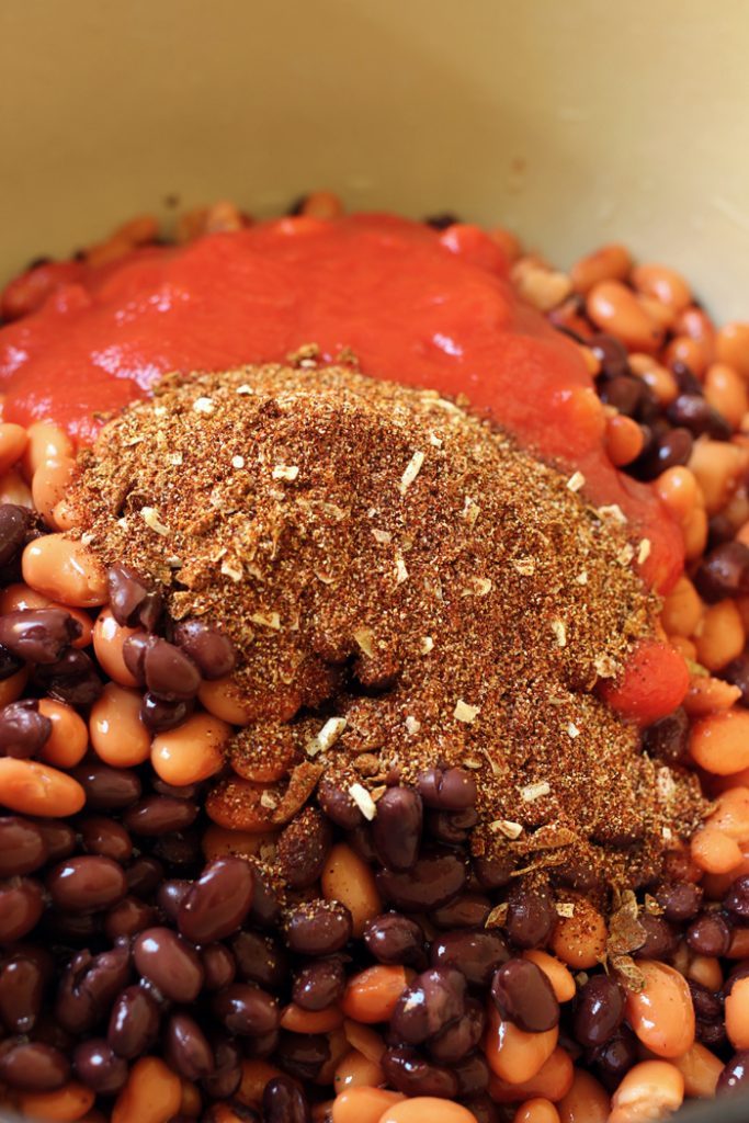 A bowl of beans and chili seasoning