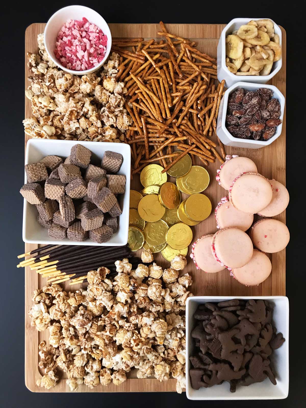 dessert board featuring pink and gold elements.