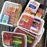 marked down meats in shopping cart