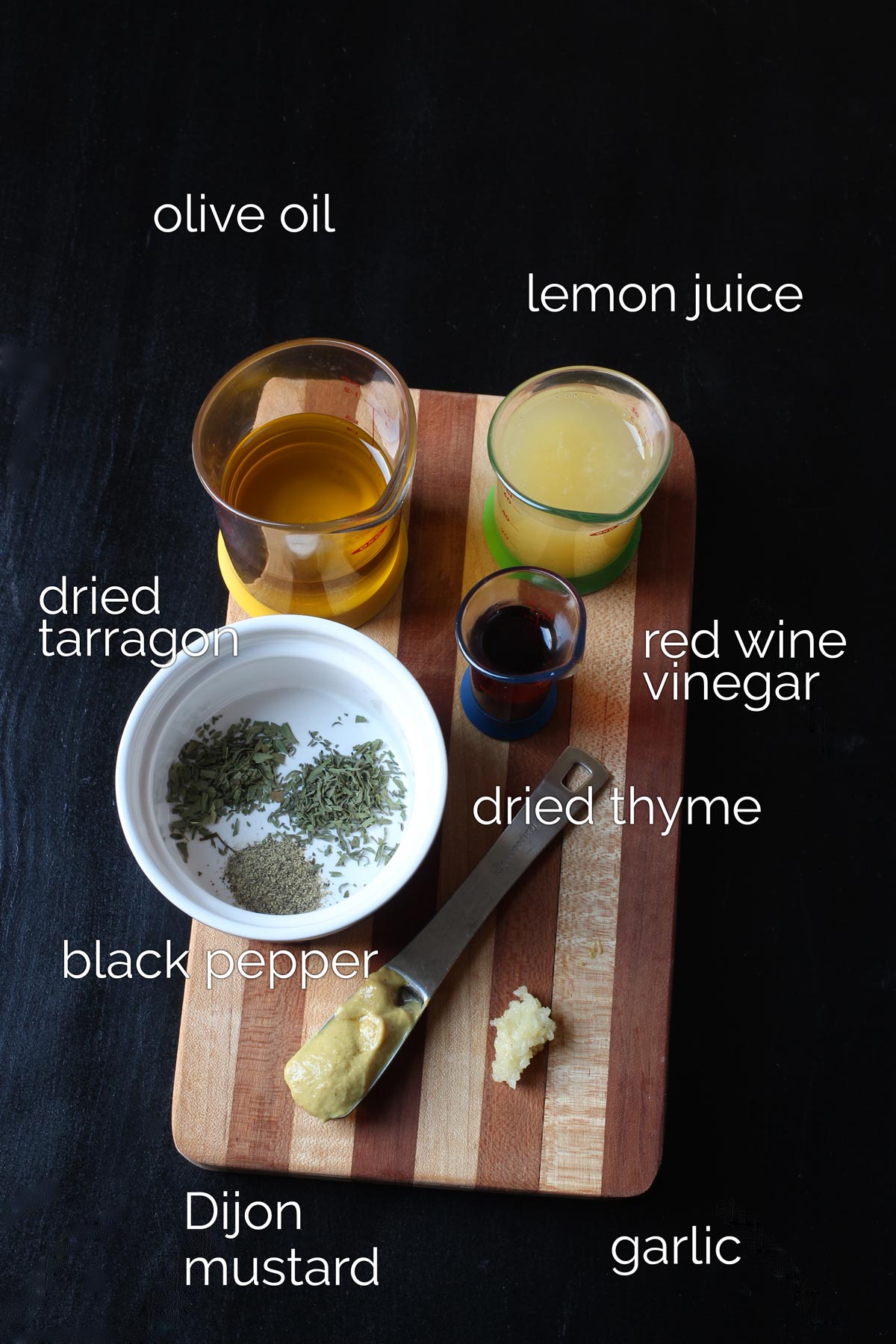 ingredients to make lemon juice and olive oil dressing.